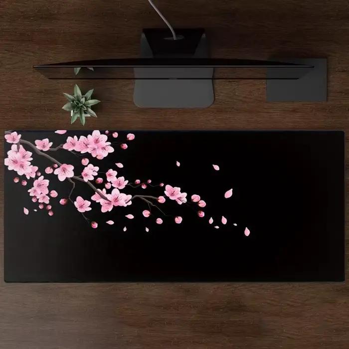 Grand tapis de souris noir avec motif de fleurs de cerisier
