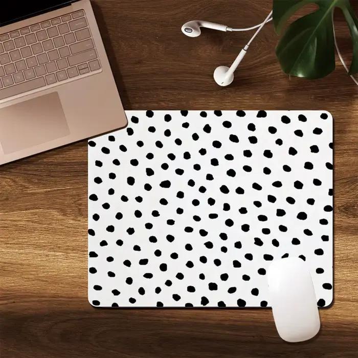 Tapis de souris à motif léopard gris
