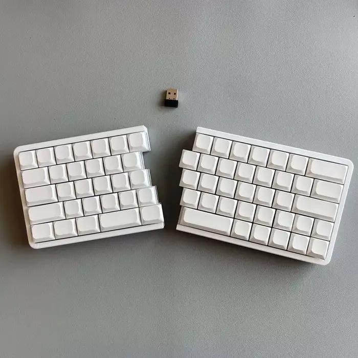 W64 – clavier mécanique ergonomique divisé 2.4G