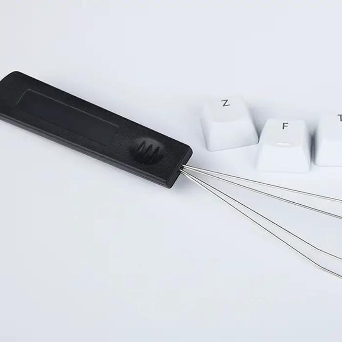 Extracteur de capuchons de clavier pour claviers mécaniques
