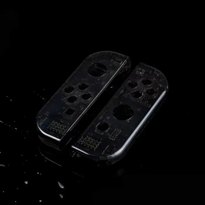Coque transparente pour manette de commutation