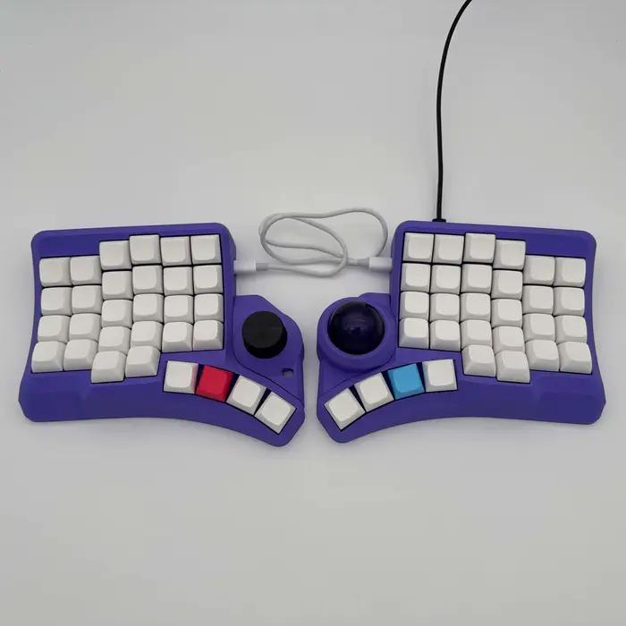 Claviers mécaniques ergonomiques incurvés