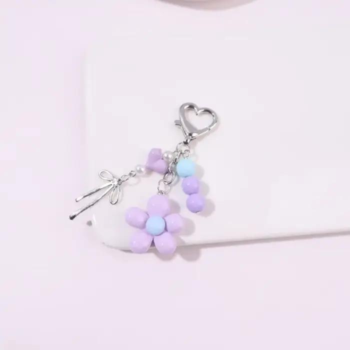 Porte-clés tendance avec pendentif fleur perlé, accessoire de sac parfait, cadeau idéal
