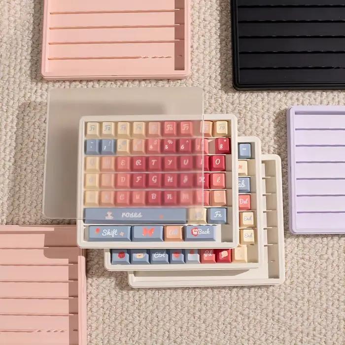 Boîte de rangement pour touches de clavier noir et blanc