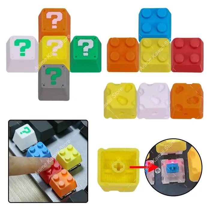 Clavier mécanique à axe croisé imprimé en 3D avec touches personnalisées en forme de point d'interrogation et de fromage