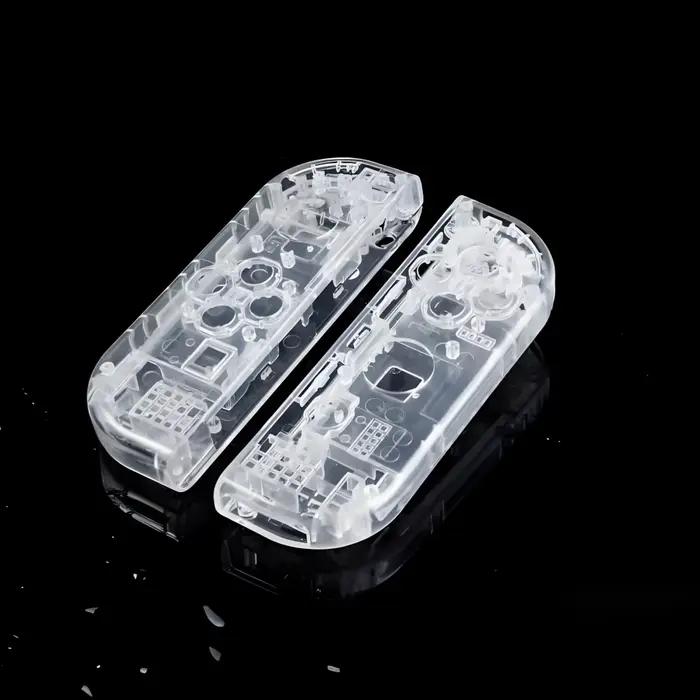 Coque transparente pour manette de commutation